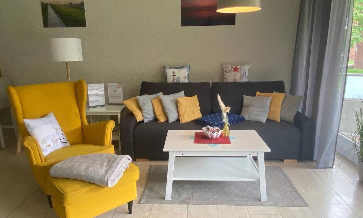 Tossens Apartment | Apartment 'Nordseeperle 8' with Shared Garden, Balcony, and Wi-Fi