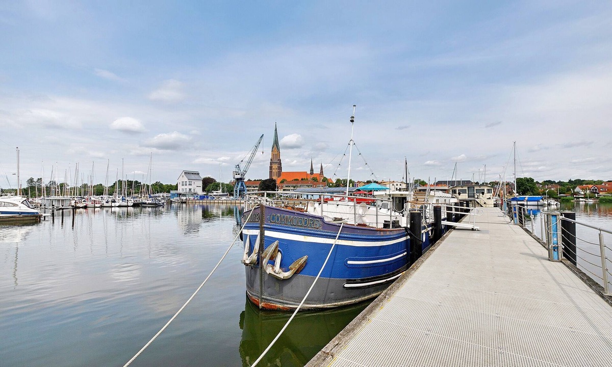Schleswig Boat Rental | Boat 'Commodore' with Sea View, Private Terrace and Wi-Fi