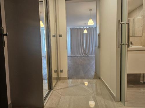 Prague 9 Apartment | Centre Design Suite O2 Arena - Parking - large glass balcony - big TV - Coffee, 24-7 Self Check-in