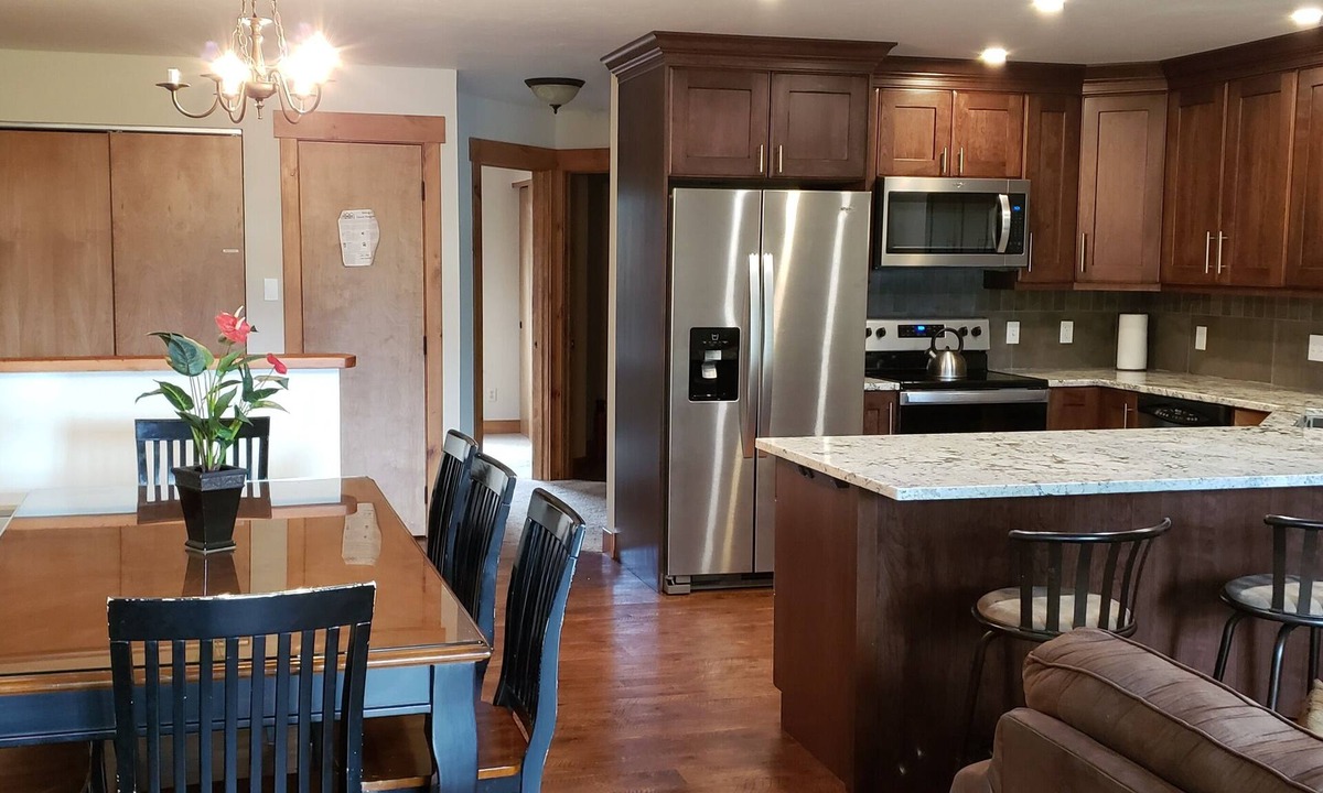 Fraser House | Enjoy great views from the hot tub at this mountain getaway.