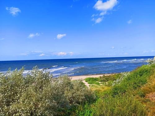 Dranske Villa | HausLIEBLINGSPLATZ - am Meer - Luxus Villa mit 4 Schlafzimmern, 3 Badezimmern Sauna, Kamin, Weber-Grill und Wallbox
