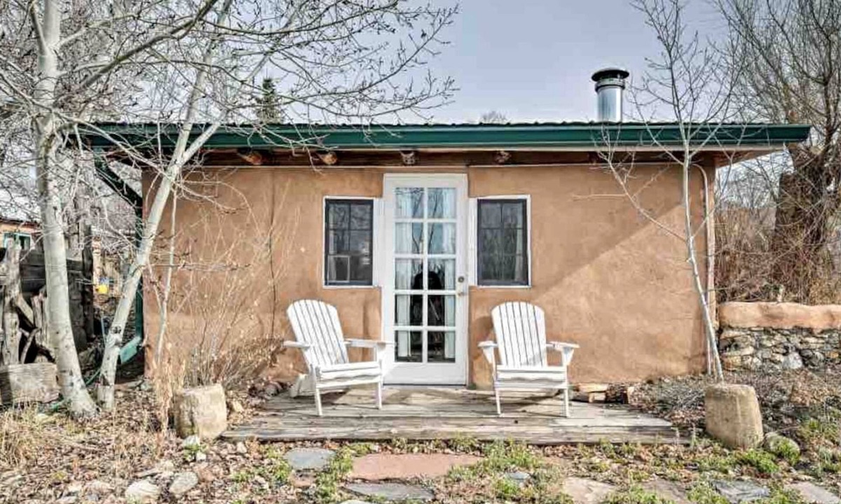 San Cristobal Cabin | Log Casita Overlooking Pond and Waterfall near Taos, New Mexico