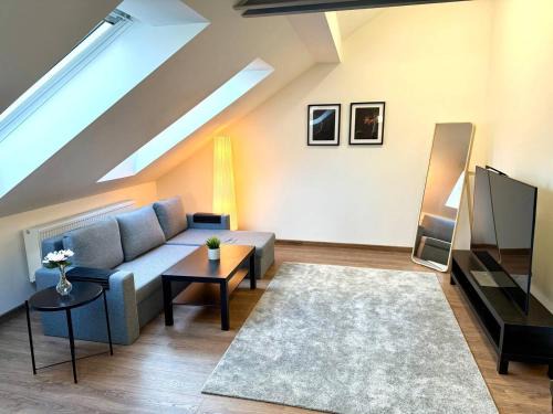 Petrska ctvrt Apartment | Modern Attic Apt in Old Town | TV | Washer & Dryer