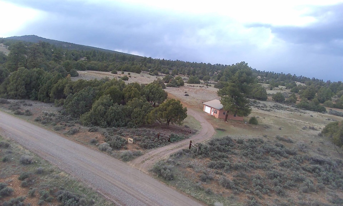 Rutheron Cabin | Rustic, Cozy Cabin Near Heron Lake with 5 Acres of Nature, Fire Pit & Views