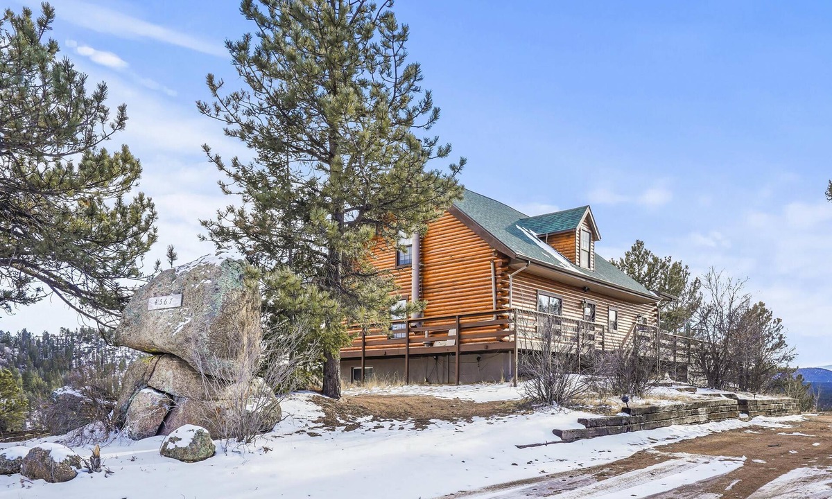 Florissant Cabin | Tranquil 30 acre retreat! Huge cabin with hot tub!