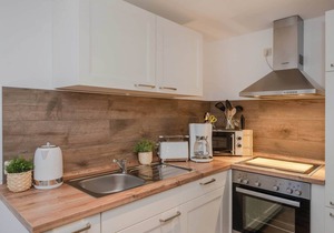 Cozy vacation apartment in Heringsdorf with large garden & whirlpool - only 550 m