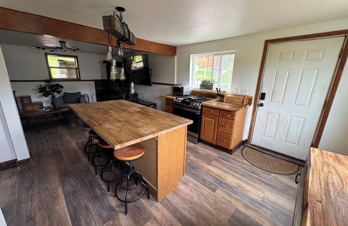 Kittredge Apartment | 2BR garden level apartment close to red rocks, hiking, skiing