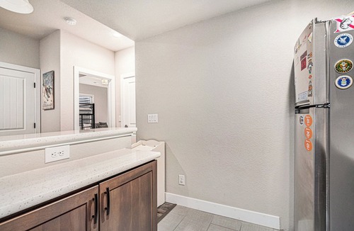 Gleneagle House | 5 Bedroom house with amenities galore! Oversized hot tub, outdoor fire pit, smoker and propane grill, sauna, play set, espresso machine, air hockey table, indoor fireplace in both living rooms, and legacy bar.