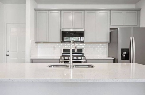 Aurora House | A cozy home near miles of trails, playgrounds, and 22 Acre Central Park.