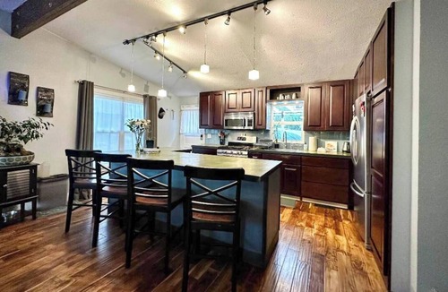 Ruby Hill House | Adventure awaits you in this stylish home with private hot tub spa, on your own enclosed patio. Remodeled home with chef's kitchen, stylish vibe and everything you need. Just minutes to everything Denver has to offer.