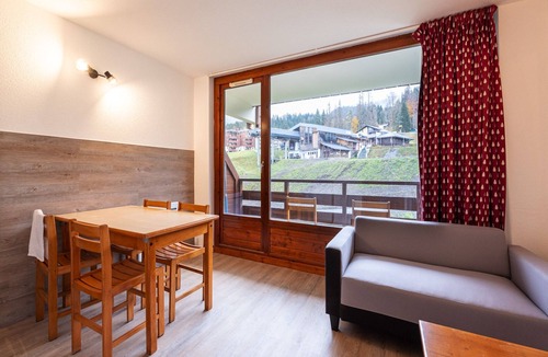Les Esserts Apartment | Apartment in Morillon with Pool & Mountain Views