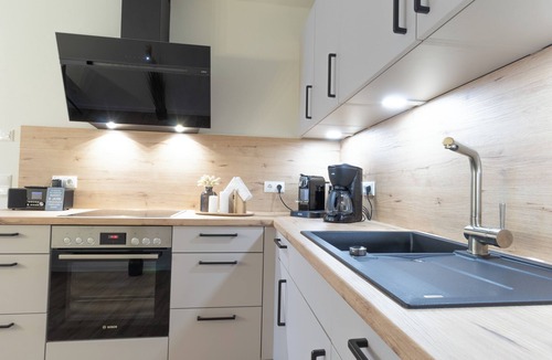 Dorumer Neufeld Apartment | Auszeit Dorum - Strandnah mit Sauna und Balkon