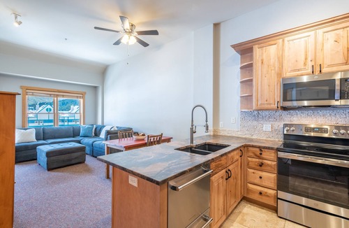 East Village at Copper Condo | Beautiful condo, just steps from Super Bee, Vaulted Ceilings! Free WiFi