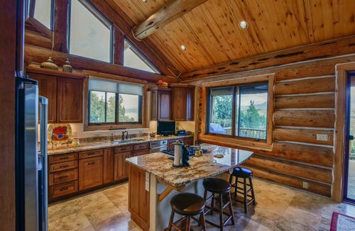 Pleasant Valley House | Breathtaking luxury log home on 44 acres. Two primary suites. STR-1-2024-053.