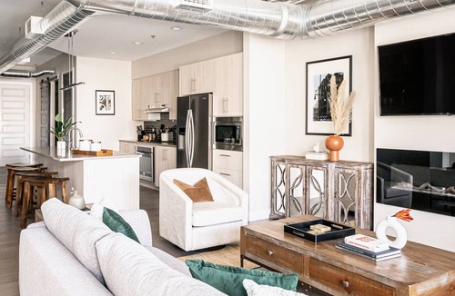 River North Art District Condo | Bright & Breezy | RiNo Loft with Custom Street Art | Dog-Friendly