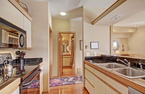 Keystone House | Bright Townhome/Vaulted Ceilings/Access to an Outdoor Pool and Hot Tub