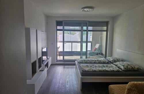 Prague 9 Apartment | Centre Design Suite O2 Arena - Parking - large glass balcony - big TV - Coffee, 24-7 Self Check-in