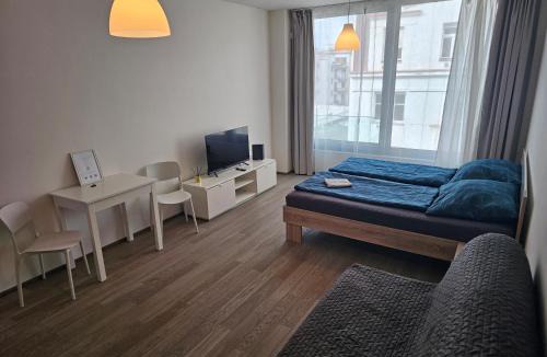 Prague 9 Apartment | Centre Design Suite O2 Arena - Parking - large glass balcony - big TV - Coffee, 24-7 Self Check-in