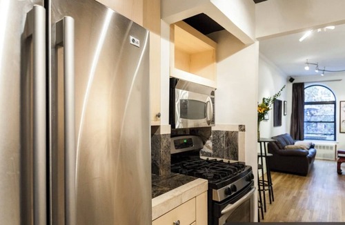 Chelsea Apartment | Chelsea stunner-1910 brick townhouse with floor through apt, working fireplace,