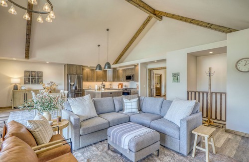 Pagosa Springs House | Cloud Cap Lake Home — a modern 3-bed, 2-bath retreat with a covered deck over serene lake views. Paddleboards, bikes, helmets & life jackets included.