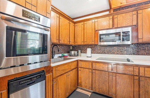 Bayfield Cabin | Comfortable Dog-Friendly Home within Walking Distance of Lake - Wooded Setting