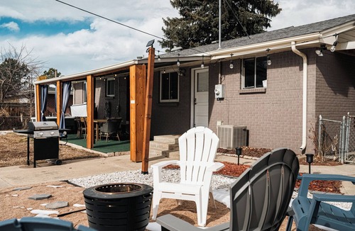 Lamar Heights Area House | Cozy 4-bedroom National Park themed house with gym + hot tub in Arvada