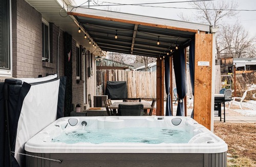 Lamar Heights Area House | Cozy 4-bedroom National Park themed house with gym + hot tub in Arvada