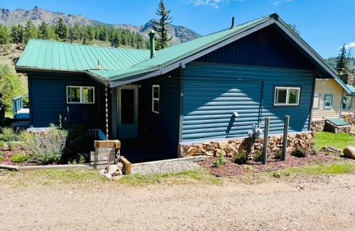 Bailey House | Cozy Riverfront Cabin with Fireplace & Deck