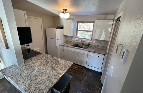 Willow Grove Condo | Cozy two Bedroom close to lake. Dogs Allowed. Semi private Hot Tub. Large Yard.