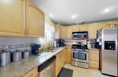 Northeast Colorado Springs House | Dog-friendly home with upper/lower decks, fireplaces, grill, & great location