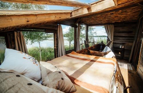 Iisalmi Resort | Elämysmajoitus Piisaminpesä