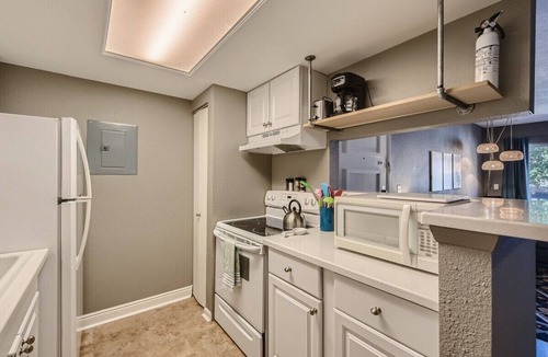 Aurora Highlands Condo | Extended Stay Rental with Pool and Patio