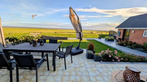 Langeneß Apartment | Ferienwohnung Hafenblick