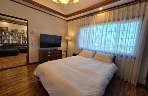 Jungmun House | gyulpang stay