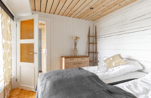 Petajavesi Villa | Hirsihuvila yksityisessä niemessä Petäjävedellä