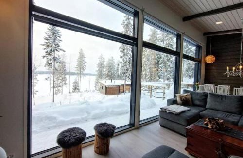Uurainen Villa | Holiday home with outdoor Jacuzzi and Sauna