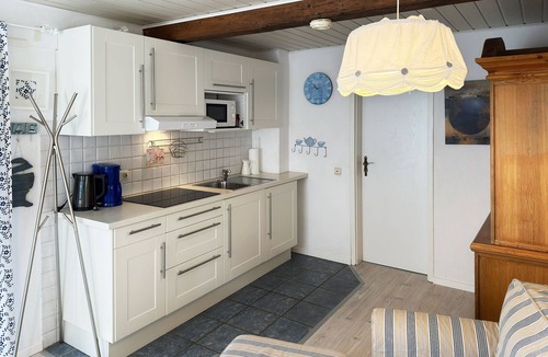Suddorf Apartment | Hüs Sanskiin vacation apartment Aawerkant with terrace, WLAN & garden view