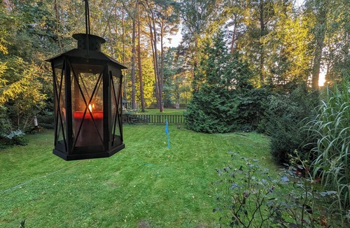 Prieros House | Idyllic wooden dacha with jetty and rowing boat just outside Berlin