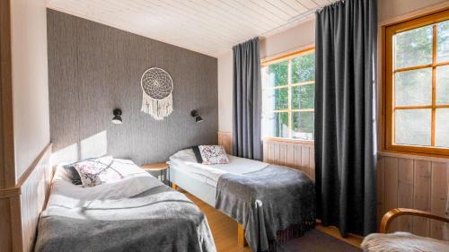 Kivipera Hotel | Isokenkäisten Klubi - Wilderness Lodge