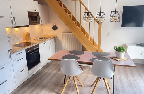 Groemitz Apartment | July 15–19: Off! Cozy vacation rental with a balcony, 2 bedrooms, and a parking space in Grömitz