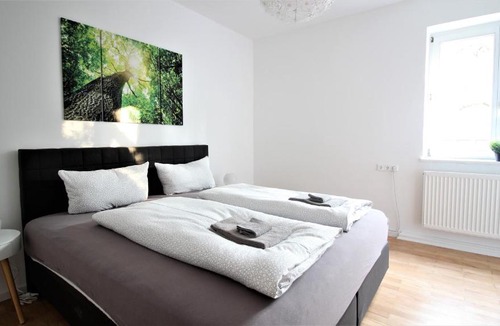 Frauenland Apartment | Light-flooded city apartment with balcony and garden