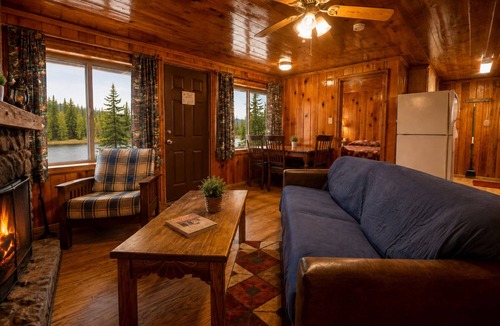 Red River Cabin | Located by the River facing the Mountains