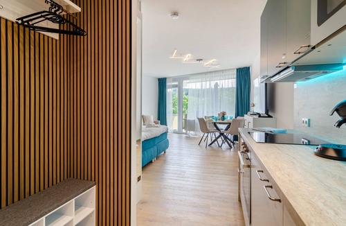 Uhldingen-Muehlhofen Apartment | Mainaublick Apartment – Comfort at Lake Constance with Sauna, Pool & Balcony View of Mainau