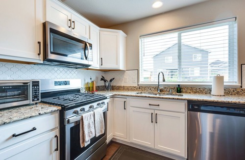 Longmont House | Mead Vacation Rental: Fenced Backyard & Fire Pit!