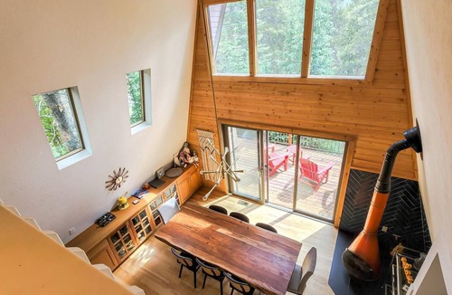 Blue River House | Mid Century Glam Chalet in the Woods with Hot Tub!