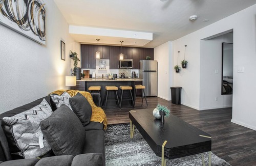 Overland Park Apartment | Mid-Rise Luxury 1 BR 1 BD Free Carport Parking WiFi and Dedicated Workspace