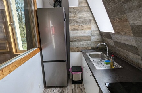 Marienfelde Apartment | Modern meets wood