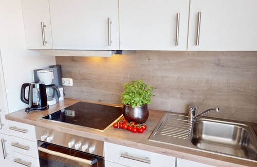 Groemitz Apartment | Modern vacation apartment for two people with balcony and private parking space