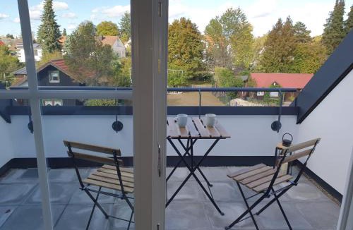 Thalkirchen - Obersendling - Forstenried - Furstenried - Solln Apartment | Moderne Dachgeschosswohnung in exklusiver Villa