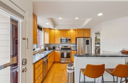 Longmont House | NEW! Cozy home with jacuzzi tub, fireplace and gym